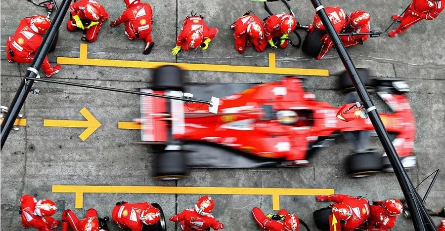 F1 Pit Stop Mechanics How pit stops work in formula 1 racing crew coordination wheel change